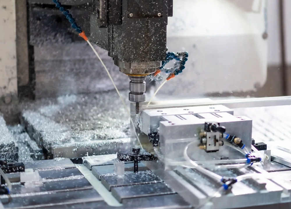 CNC machining center in operation at Axtratech's manufacturing facility